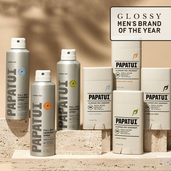 Papatui deodorant products displayed on a stone surface with a 'Glossy Men's Brand of the Year' sign.