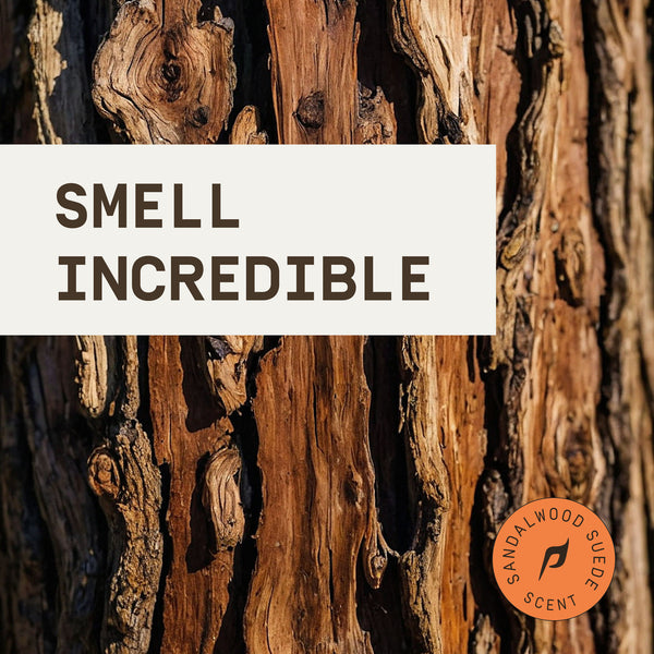 Close-up of sandalwood with 'Smell Incredible' text and sandalwood suede scent logo.