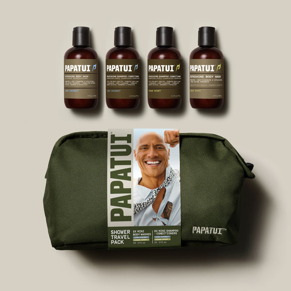 Papatui holiday gift set shower travel pack dopp kit includes a green bathroom bag with Dwayne "The Rock" Johnson on the cover with lush coconut and cedar sport body wash and shampoo and conditioner.