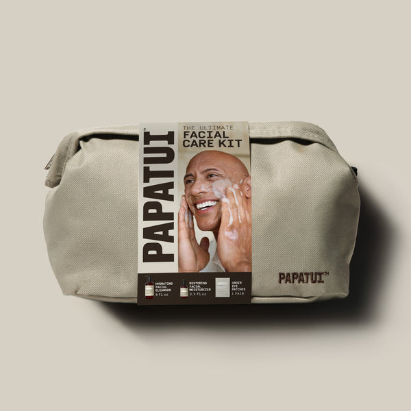 Papatui Holiday gift set facial care dopp kit with Dwayne the Rock Johnson on the belly band. Gift set includes men's hydrating facial cleanser, restoring facial moisturizer, and under eye patches.