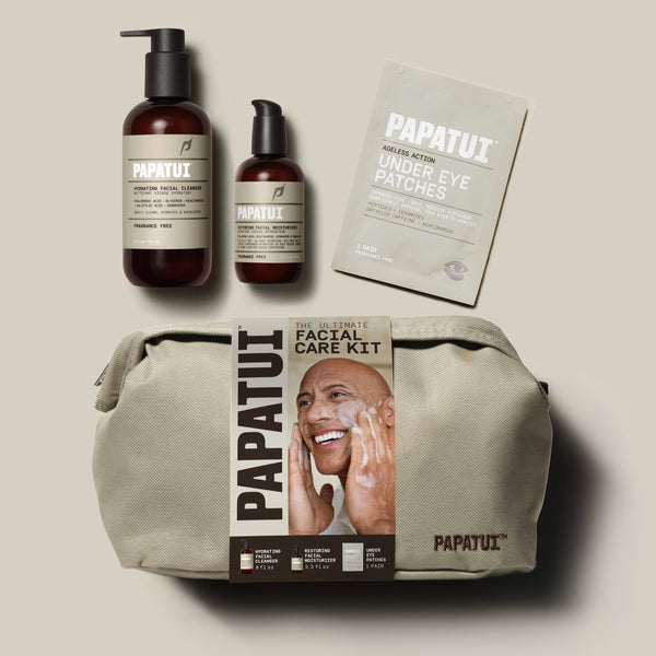 Papatui Holiday gift set facial care dopp kit with Dwayne the Rock Johnson on the belly band. Gift set includes men's hydrating facial cleanser, restoring facial moisturizer, and under eye patches.
