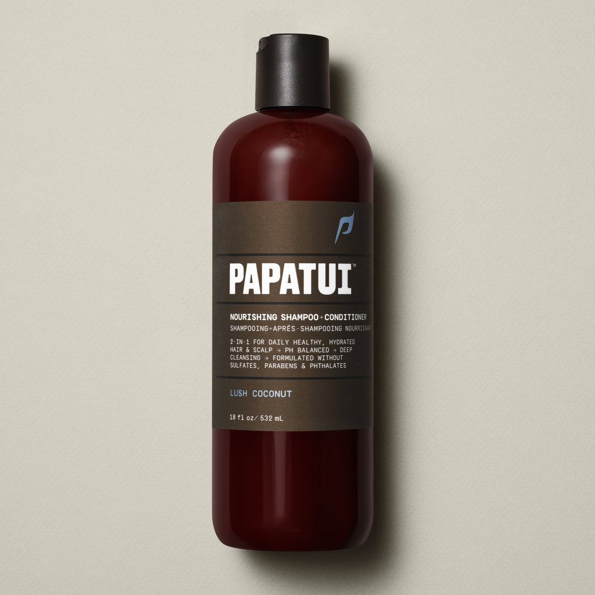 Papatui Lush Coconut Nourishing Men's 2-in-1 Shampoo + Conditioner shampoo bottle on a neutral background