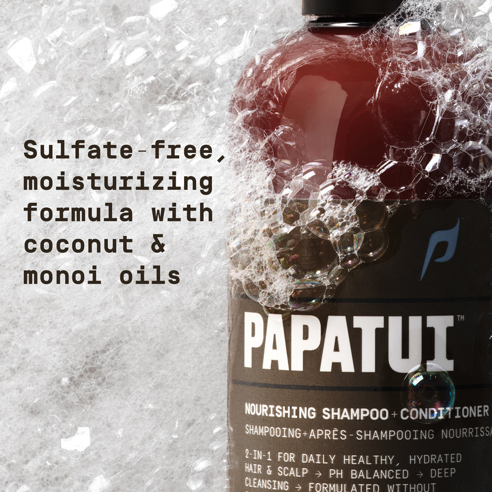 Papatui Lush Coconut Nourishing Men's 2-in-1 Shampoo + Conditioner bottle against a soapy background with text overlay reading "Sulfate-free, moisturizing formula with coconut & monoi oils"