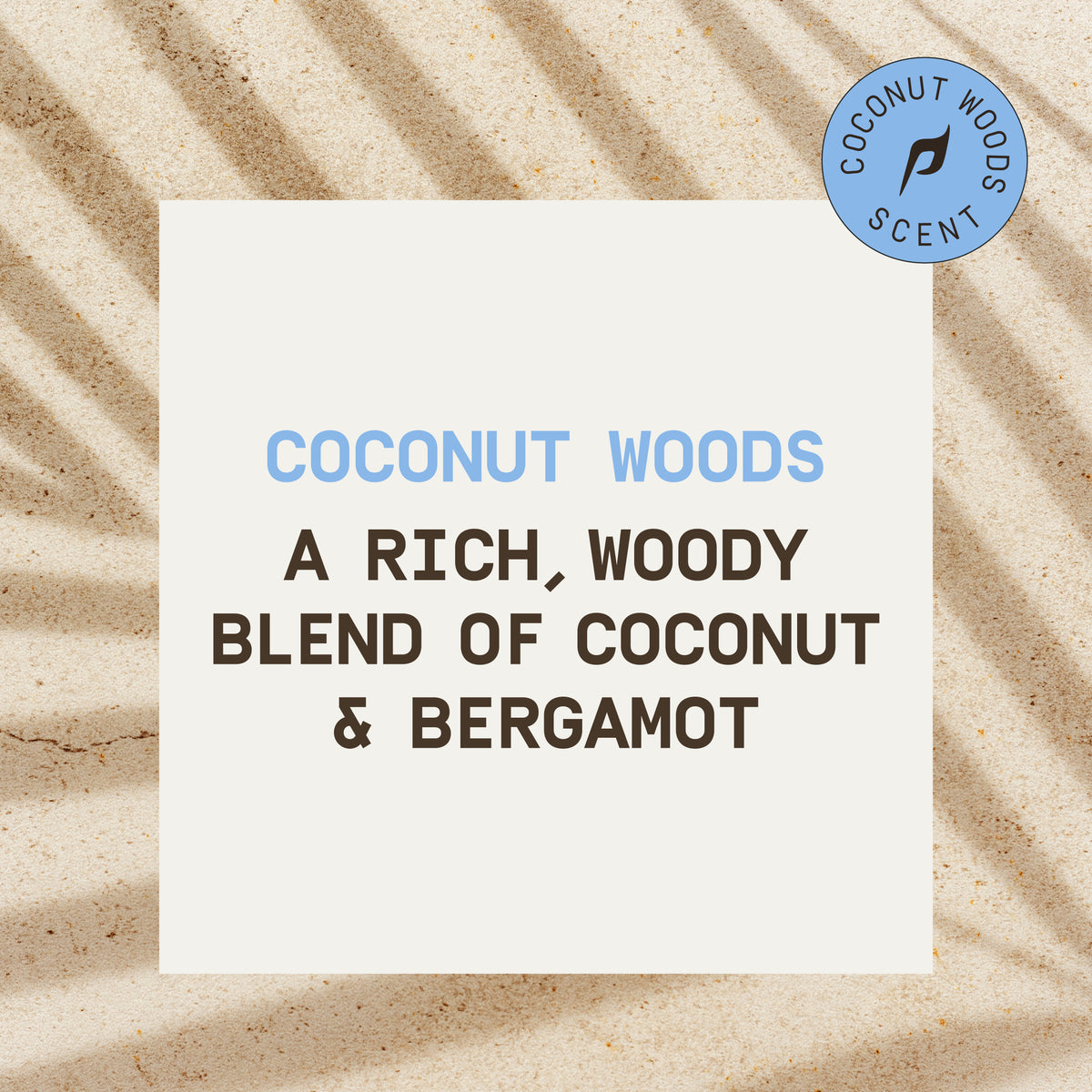 PAPATUI™ Coconut Woods scent card on textured sand background. Text reads: "A rich, woody blend of coconut & bergamot," highlighting the signature fragrance.