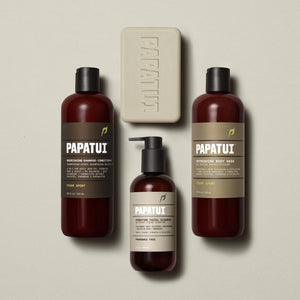 Group display of the full PAPATUI™ Ultimate Shower Bundle. Includes Hydrating Facial Cleanser, Cedar Sport Nourishing Shampoo + Conditioner, Cedar Sport Refreshing Body Wash, and Cedar Sport Enriching Big Bar Soap, all set against a soft beige background.