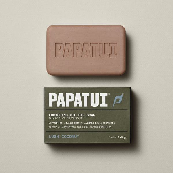 PAPATUI™ Enriching Big Bar Soap in Lush Coconut scent, shown with rose-toned soap bar and matching box. Formulated with vitamin B3, mango butter, avocado oil, and ceramides to cleanse and moisturize for long-lasting freshness.