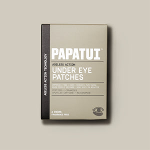 PAPATUI™ Ageless Action Under Eye Patches box, featuring sleek beige and black packaging with bold white PAPATUI™ branding. The product is formulated to reduce puffiness, fine lines, and dark circles with peptides, ceramides, upcycled caffeine, and niacinamide. Includes six fragrance-free pairs.
