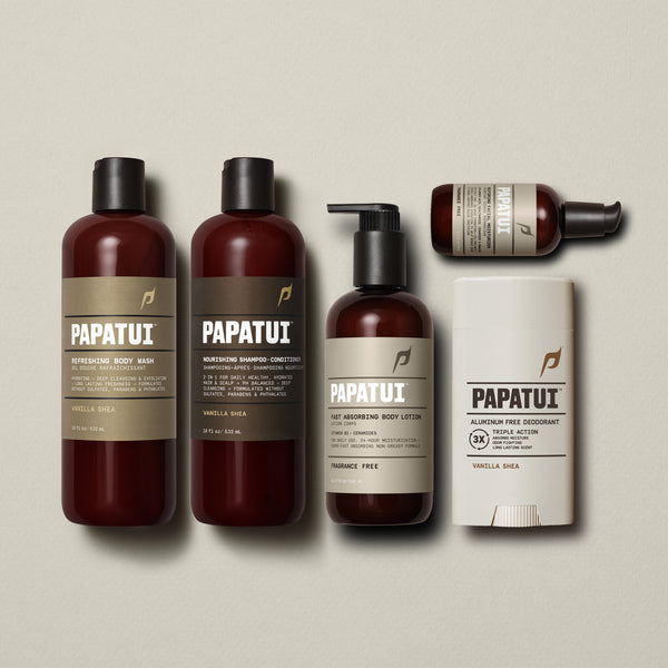 Papatui Body wash, shampoo and conditioner, deodorant in the scent vanilla shea and unscented body lotion and facial moisturizer lined up on a beige background.