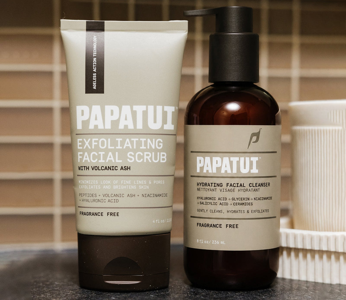 PAPATUI Exfoliating Facial Scrub and PAPATUI Hydrating Facial Cleanser against a shelving background