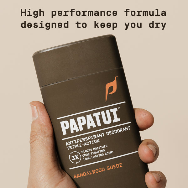 Papatui antiperspirant deodorant stick held in a hand with text on a beige background