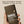 Papatui antiperspirant deodorant stick held in a hand with text about high performance formula.