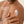 Man applying Papatui lotion to his arm with a text overlay saying 'Non-greasy formula'.