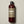 Papatui Sandalwood Suede body wash bottle on a beige background - front of pack