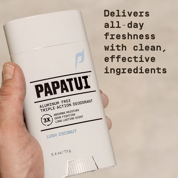 Papatui deodorant stick held by a hand with 'Delivers all-day freshness with clean, effective ingredients' text overlay on a beige background.