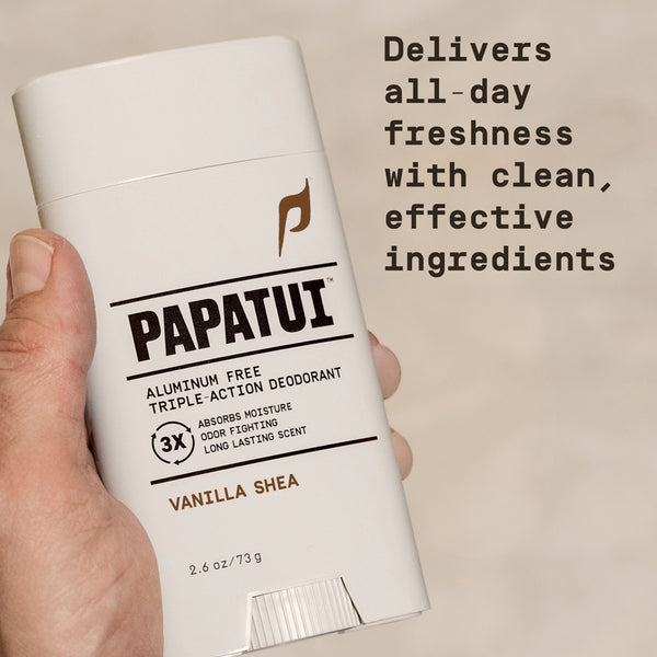 Papatui deodorant stick held by a hand with 'Delivers all-day freshness with clean, effective ingredients' text overlay on a beige background
