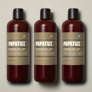 3 papatui body wash lined up on a plain background in the scents cedar sport, sandalwood suede, and lush coconut.