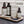 PAPATUI™A premium men’s skincare lineup displayed on a wooden tray, featuring the Hydrating Facial Cleanser, Rejuvenating Toner, Restoring Facial Moisturizer, Awakening Eye Gel, and Ageless Action Under Eye Patches. A 