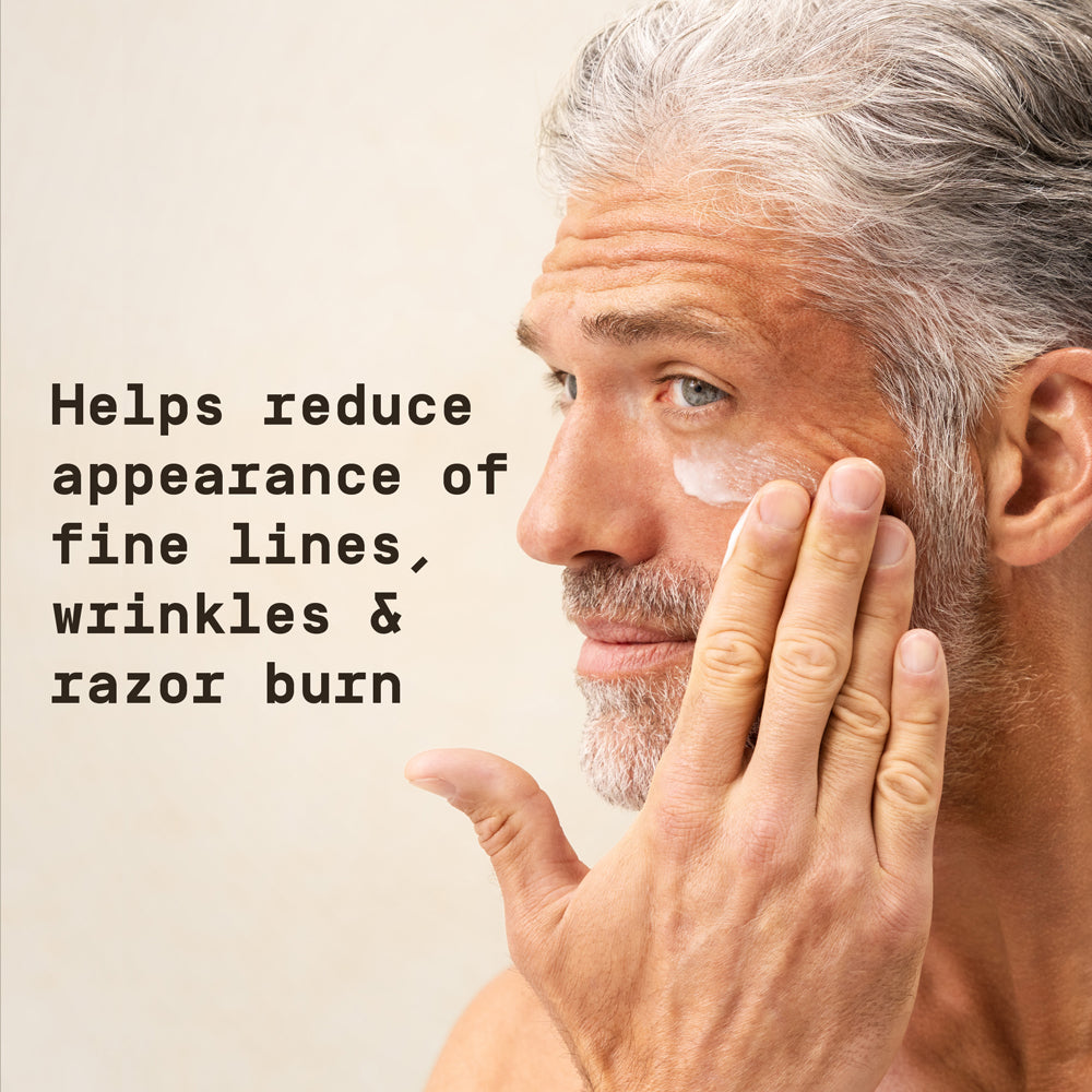 Man applying Papatui Restoring Facial Moisturizer to his face against a neutral background with text overlay reading "Helps reduce appearance of fine lines, wrinkles & razor burn"