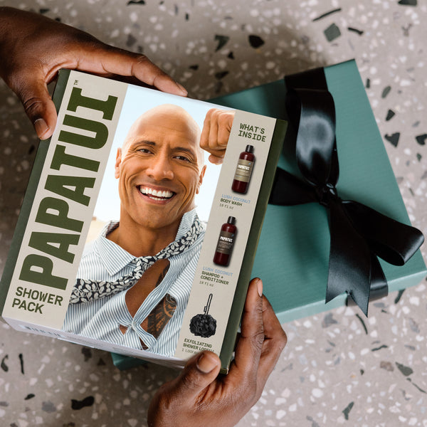 Dwayne "The Rock" Johnson's lush coconut shower with loofah is placed with other gift sets to promote holiday and giftable men's care.