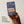 Papatui pimple patches packaging held by a hand with a neutral background
