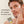 Man applying a tube of Papatui Men's daily moisturizer SPF with tan background with text reading 