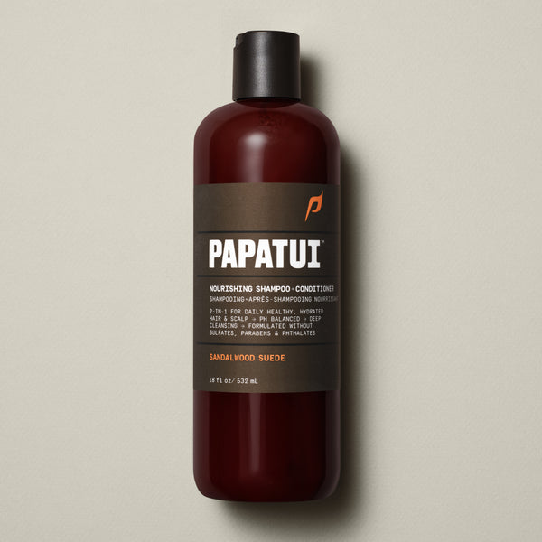 Papatui Sandalwood Suede shampoo bottle on a beige background - front of pack