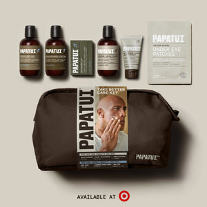 Papatui Holiday gift set facial care dopp kit with Dwayne the Rock Johnson on the belly band. Gift set includes men's hydrating facial cleanser, restoring facial moisturizer, and under eye patches and Papatui lush coconut mini body wash, shampoo and conditioner, and bar soap all in travel sizes. Available at Target.