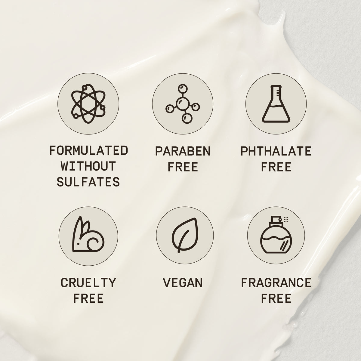 A smooth, creamy background highlighting six circular icons that represent key benefits of PAPATUI™ Enhancing Tattoo Balm. Each icon features a minimalist design with bold text beneath: 'Formulated Without Sulfates' (atomic structure icon), 'Paraben Free' (molecular structure icon), 'Phthalate Free' (lab flask icon), 'Cruelty Free' (bunny icon), 'Vegan' (leaf icon), and 'Fragrance Free' (perfume bottle icon). The soft, spread balm texture reinforces the product’s nourishing, clean, and skin-friendly formula
