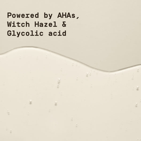 Text overlay on a beige background with a liquid toner on the surface, featuring ingredients like AHAs, Witch Hazel, and Glycolic acid.