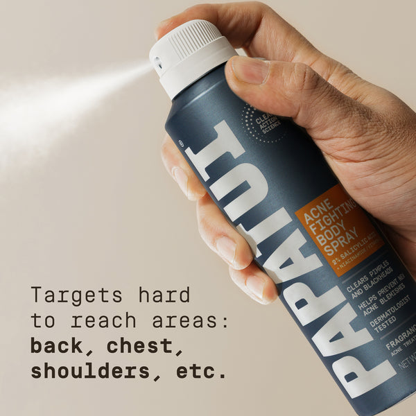 Hand holding a PAPATUI Acne Fighting Body Spray with text on a beige background for hard to reach places.