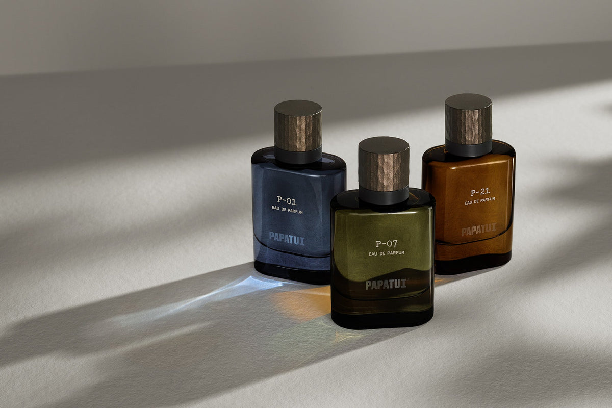 Three PAPATUI Luxury Colones, P-01 (Blue), P-07 (Green), and P-21 (Amber) against a white background