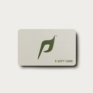 The image shows an e-gift card for Dwayne Johnson’s brand, PAPATUI™ . The card has a sleek, minimalist design with a white background and a prominent black stylized “P” logo in the center. The word “E-GIFT CARD” is printed in black on the lower right corner.