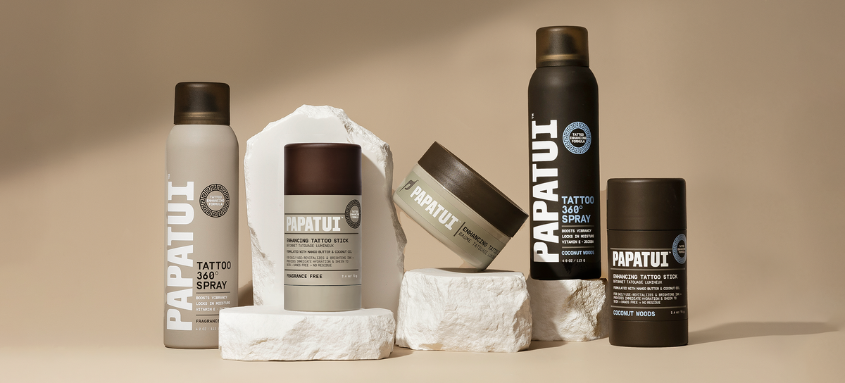 All PAPATUI tattoo products against a neutral background with white rocks