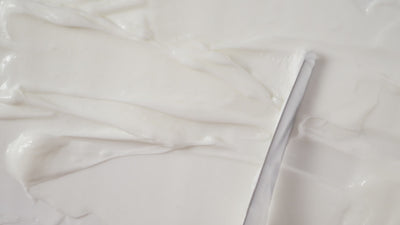 video of white cream being spread