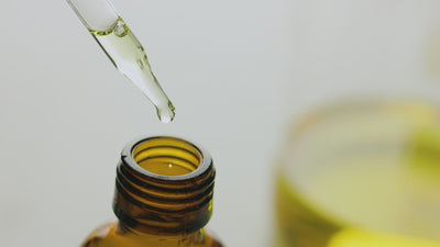 Video of oil dripping from a dropper into a bottle